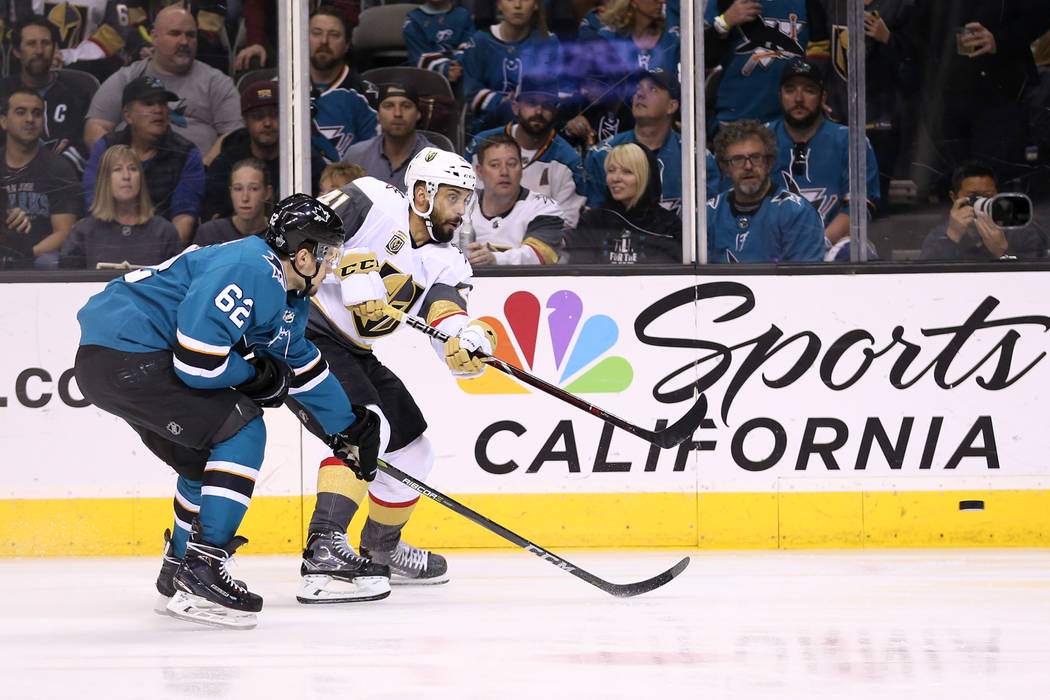 Vegas Golden Knights left wing Pierre-Edouard Bellemare (41) takes a shot under pressure from San Jose Sharks right wing Kevin Labanc (62) during the first period in Game 6 of an NHL hockey second ...