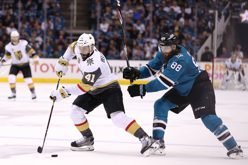 San Jose Sharks defenseman Brent Burns (88) defends against Vegas Golden Knights left wing Pierre-Edouard Bellemare (41) during the second period in Game 6 of an NHL hockey second-round playoff se ...