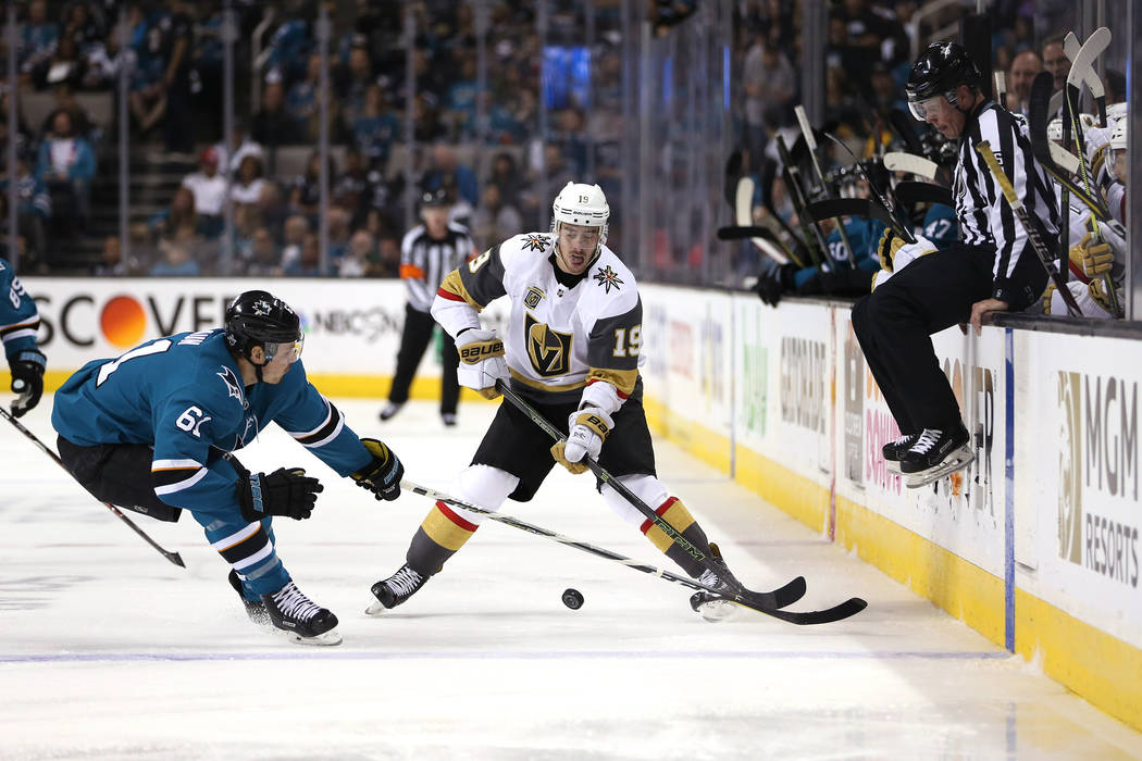 San Jose Sharks defenseman Justin Braun (61) defends against Vegas Golden Knights right wing Reilly Smith (19) during the second period in Game 6 of an NHL hockey second-round playoff series at th ...