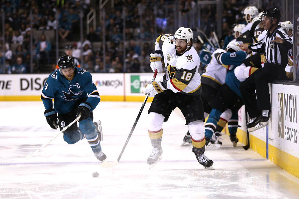 San Jose Sharks center Joe Pavelski (8) defends against Vegas Golden Knights left wing James Neal (18) during the second period in Game 6 of an NHL hockey second-round playoff series at the SAP Ce ...