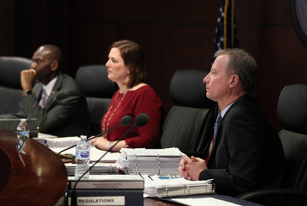 Gaming Control Board members, from left, Terry Johnson, chairwoman Becky Harris and Shawn Reid listen during a March meeting in Las Vegas. (K.M. Cannon Las Vegas Review-Journal)