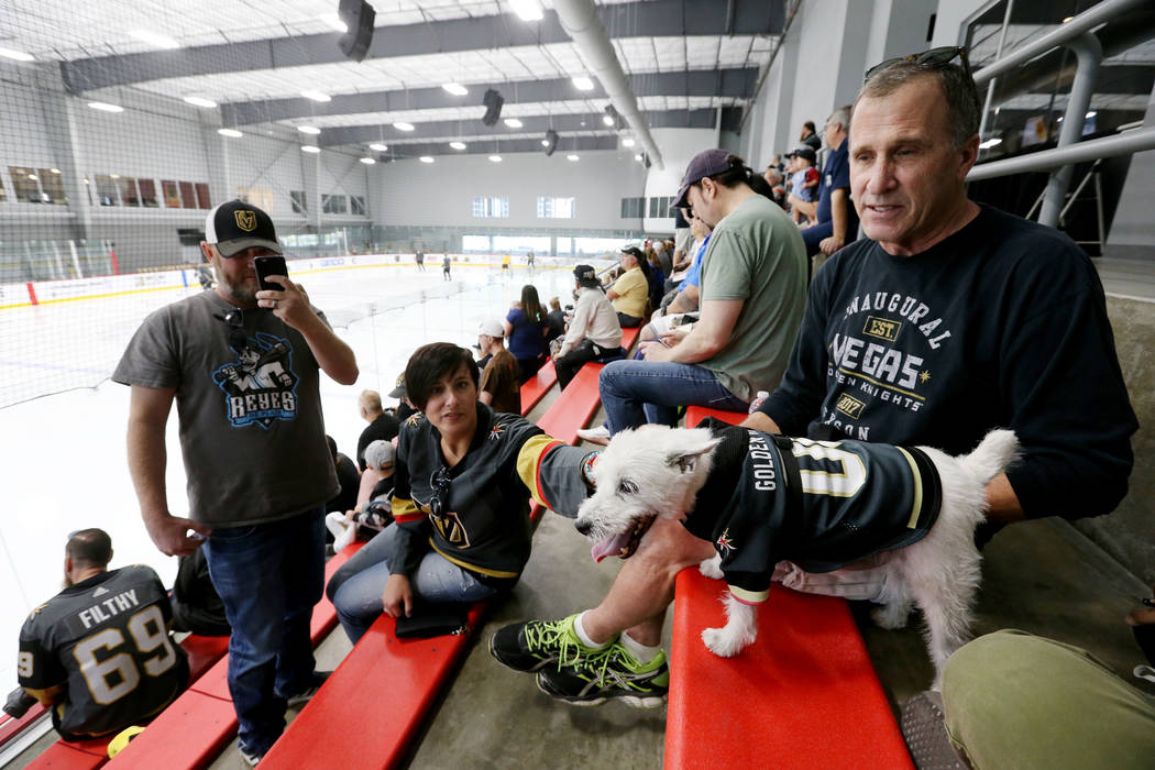 Bark-Andre Furry and his owner, Rick Williams, watch the Vegas Golden Knights practice as Frank Acosta and Darla Schneider watch Bark at City National Arena in Las Vegas on Wednesday, May 9, 2018. ...