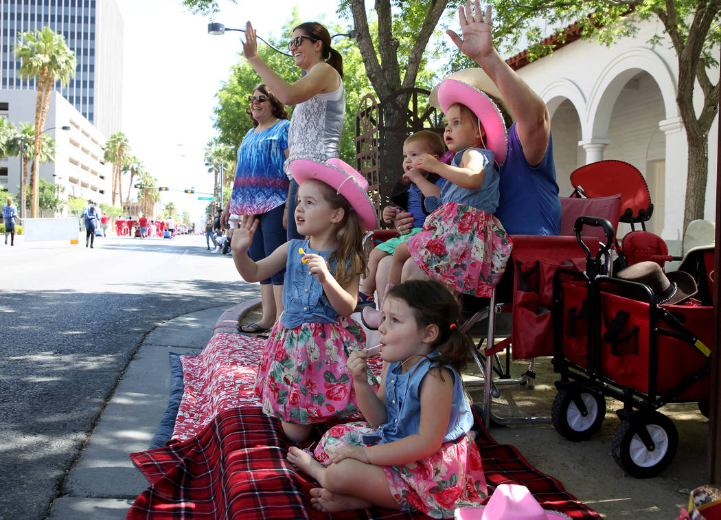 Las Vegas cousins, from left, Alexandra Hayes, 4, Sydney Hayes, 4, Luke Nelson, 15 months, and Grace Nelson, 2, watch the Helldorado Days parade in downtown Las Vegas Saturday, May 12, 2018. K.M. ...