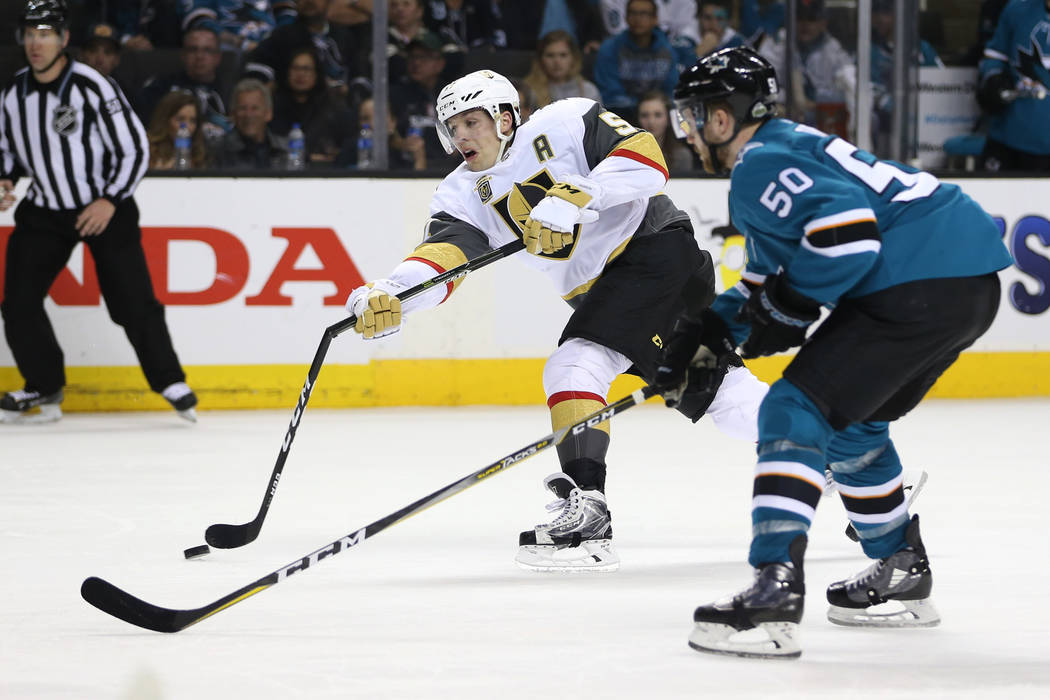 Vegas Golden Knights left wing David Perron (57) takes a shot against San Jose Sharks center Chris Tierney (50) during the third period in Game 4 of an NHL hockey second-round playoff series at th ...