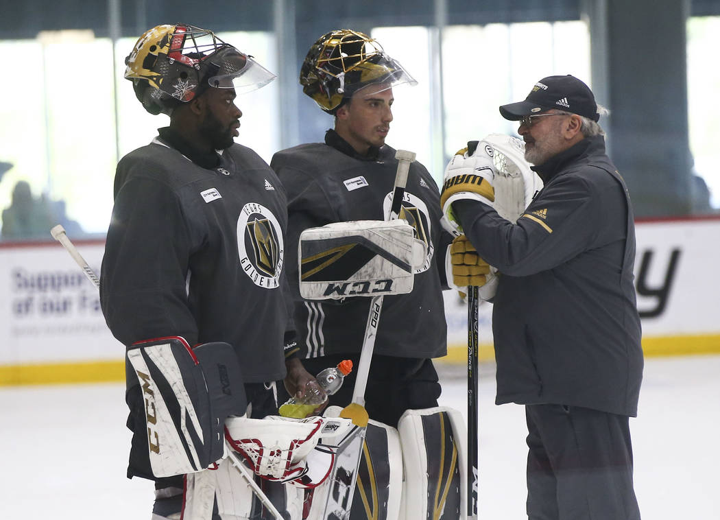 Golden Knights goaltending coach David Prior, right, talks with goaltenders Malcolm Subban, left, and Marc-Andre Fleury during practice at City National Arena in Las Vegas on Thursday, May 10, 201 ...