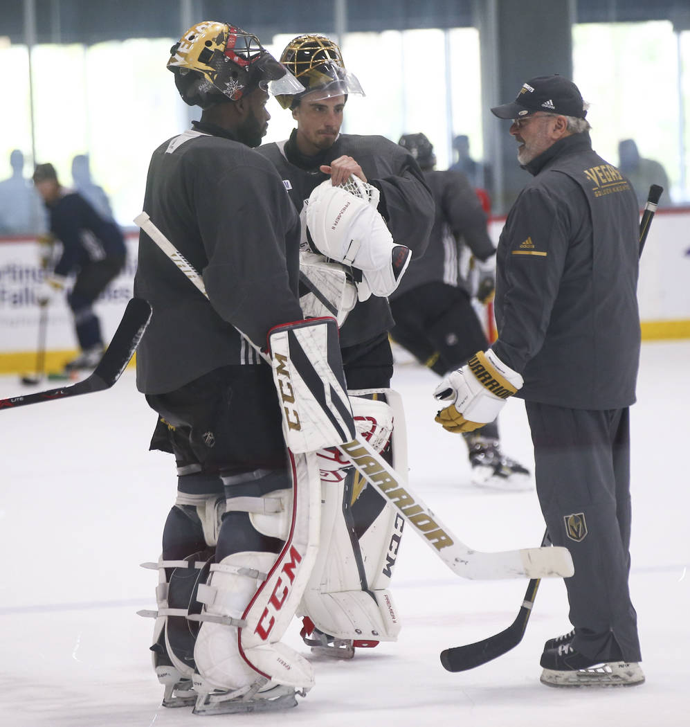 Golden Knights goaltending coach David Prior, right, talks with goaltenders Malcolm Subban, left, and Marc-Andre Fleury during practice at City National Arena in Las Vegas on Thursday, May 10, 201 ...