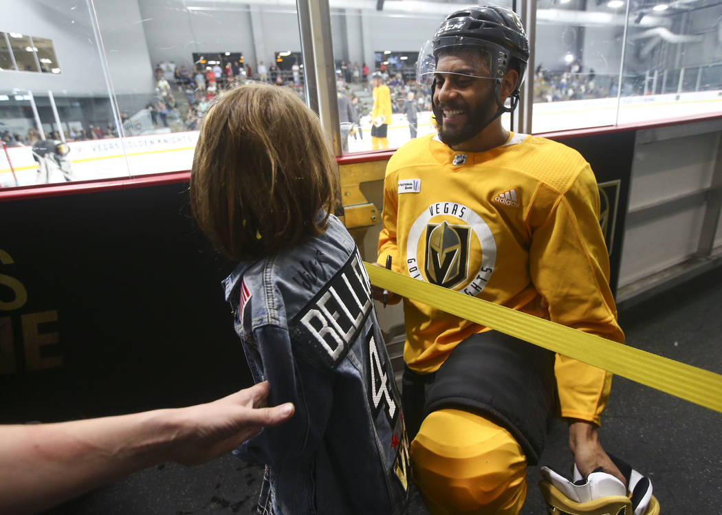 Golden Knights left wing Pierre-Edouard Bellemare (41) greets a young fan during practice at City National Arena in Las Vegas on Thursday, May 10, 2018. Chase Stevens Las Vegas Review-Journal @css ...