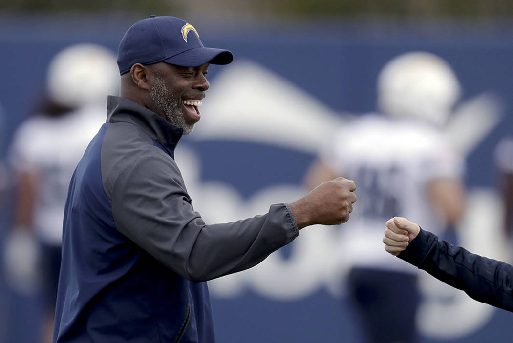 Los Angeles Chargers coach Anthony Lynn smiles during the team's NFL football rookie minicamp Friday, May 11, 2018, in Costa Mesa, Calif. (AP Photo/Chris Carlson)