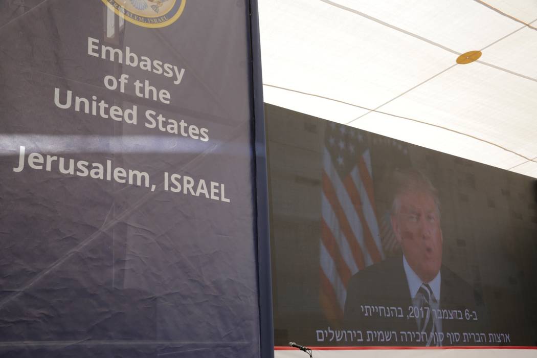 U.S. President Donald Trump is seen on screen as he delivers his speech during the opening ceremony of the new U.S. embassy in Jerusalem, Monday, May 14, 2018. Amid deadly clashes along the Israel ...
