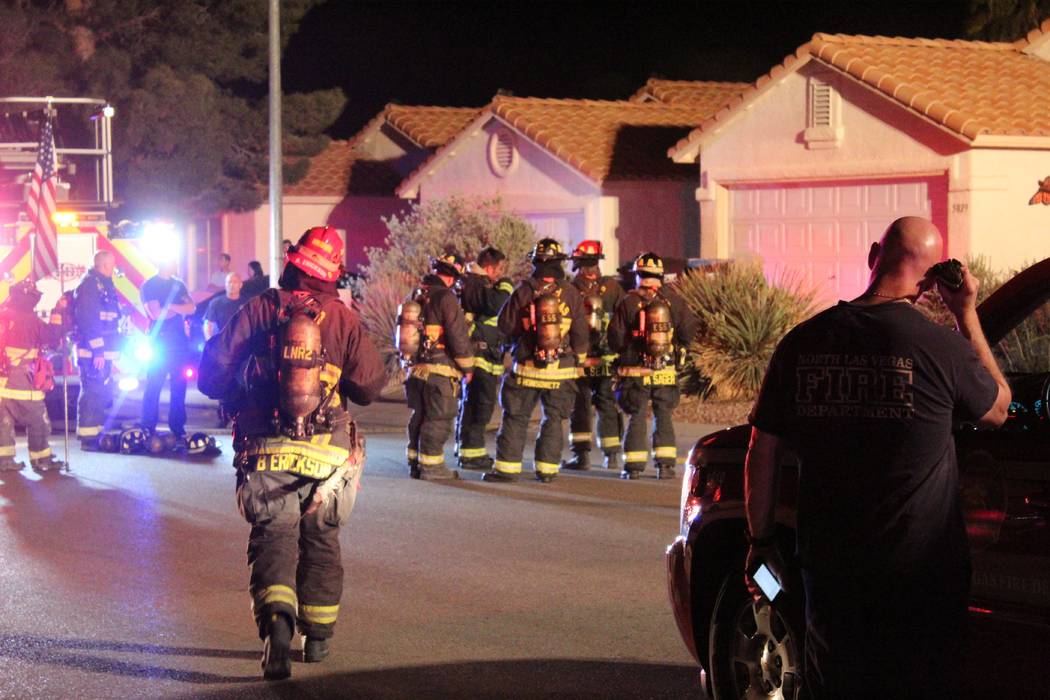 Firefighters from the North Las Vegas Fire Department respond to a fire at 5920 N. Vista Del Rancho Way. (Max Michor/Las Vegas Review-Journal)