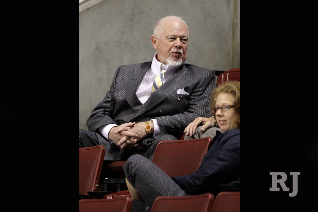 Canadian hockey announcer Don Cherry watches the Philadelphia Flyers during practice at the NHL Stanley Cup hockey finals on Tuesday, June 8, 2010, in Philadelphia. (AP Photo/Mark Humphrey)