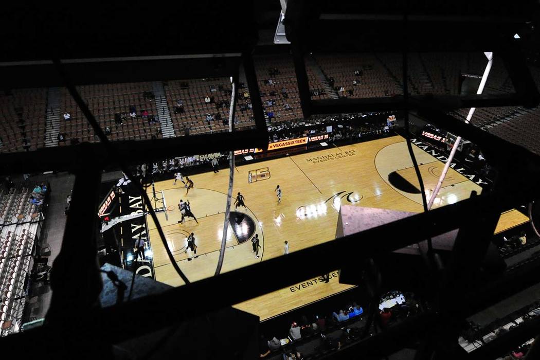The floor of the Mandalay Bay Events Center is seen behind the arena's lights during a Vegas 16 college basketball game between Oakland and ETSU in the second half of their NCAA college basketball ...