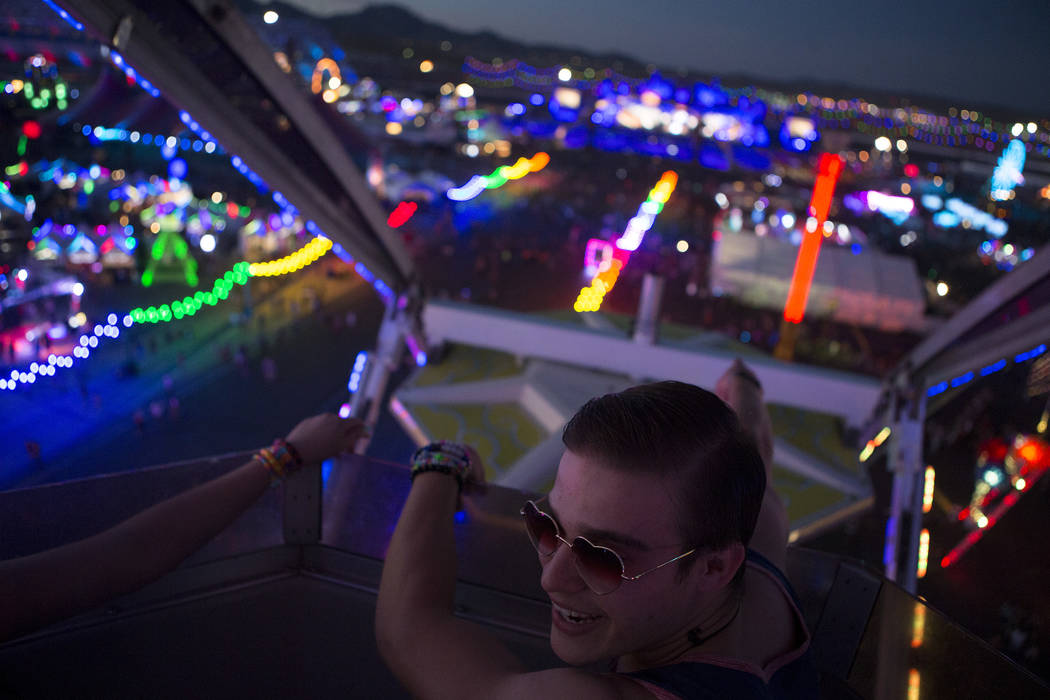 Luis Huerta from Los Angeles rides the Ferris wheel with friends on the second night of Electric Daisy Carnival at Las Vegas Motor Speedway on Saturday, June 17, 2017 in Las Vegas. Bridget Bennett ...