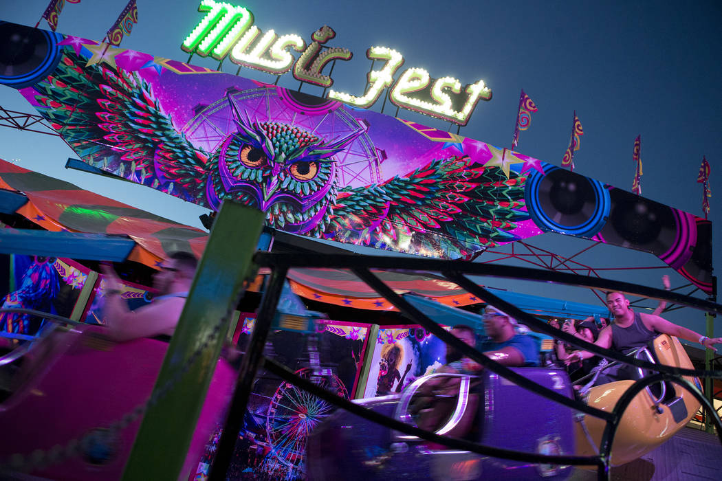 Attendees enjoy a ride on the first night of Electric Daisy Carnival at Las Vegas Motor Speedway on Friday, June 16, 2017 in Las Vegas. Bridget Bennett Las Vegas Review-Journal @bridgetkbennett