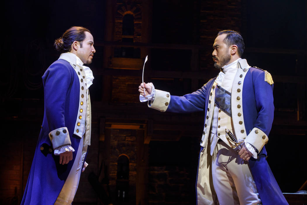 Joseph Morales as Alexander Hamilton and Marcus Choi as George Washington in the musical "Hamilton," playing The Smith Center May 29-June 24.