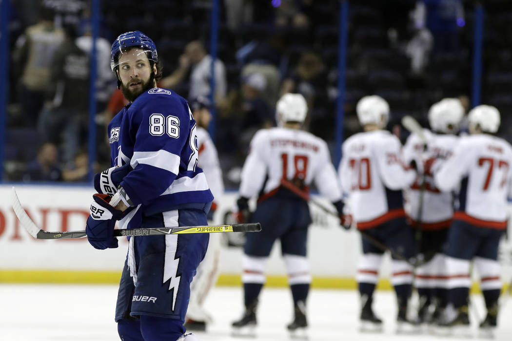 Tampa Bay Lightning right wing Nikita Kucherov (86) leaves the ice as the Washington Capitals celebrate their 6-2 win during Game 2 of the NHL Eastern Conference finals hockey playoff series Sunda ...