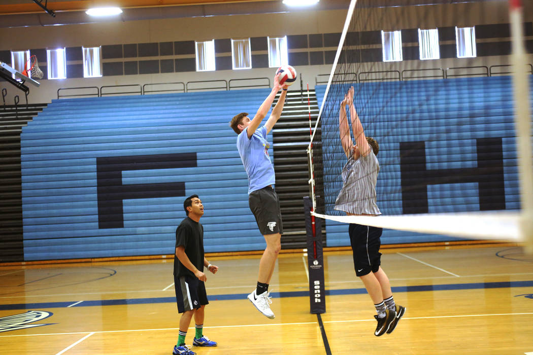 Caleb Stearman, 17, of the Foothill High School mens volleyball team, spikes the ball during practice at Foothill High School in Henderson, Monday, May 14, 2018. Stearman is both a setter on the v ...
