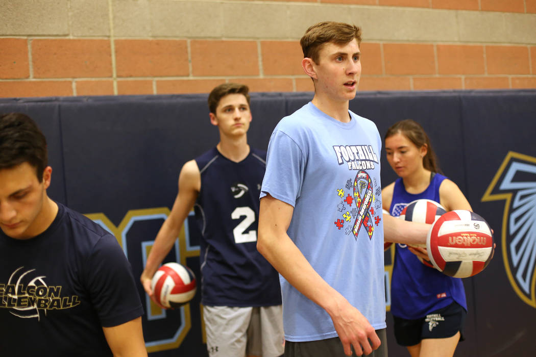 Caleb Stearman, 17, of the Foothill High School mens volleyball team, prepares to serve during practice at Foothill High School in Henderson, Monday, May 14, 2018. Stearman is both a setter on the ...
