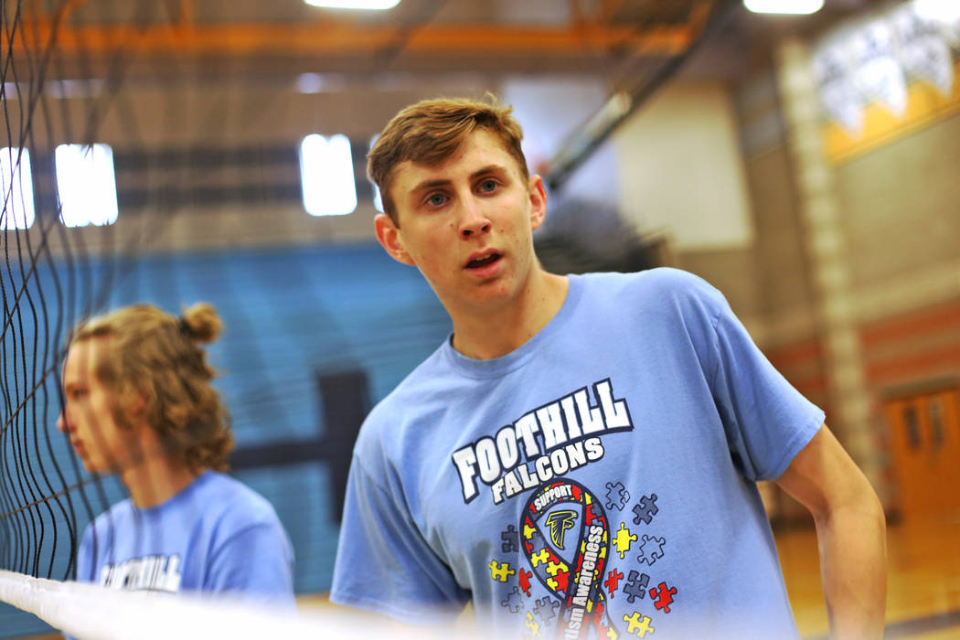 Caleb Stearman, 17, of the Foothill High School mens volleyball team, listens to direction from Coach Lewis Miranda during practice at Foothill High School in Henderson, Monday, May 14, 2018. Stea ...