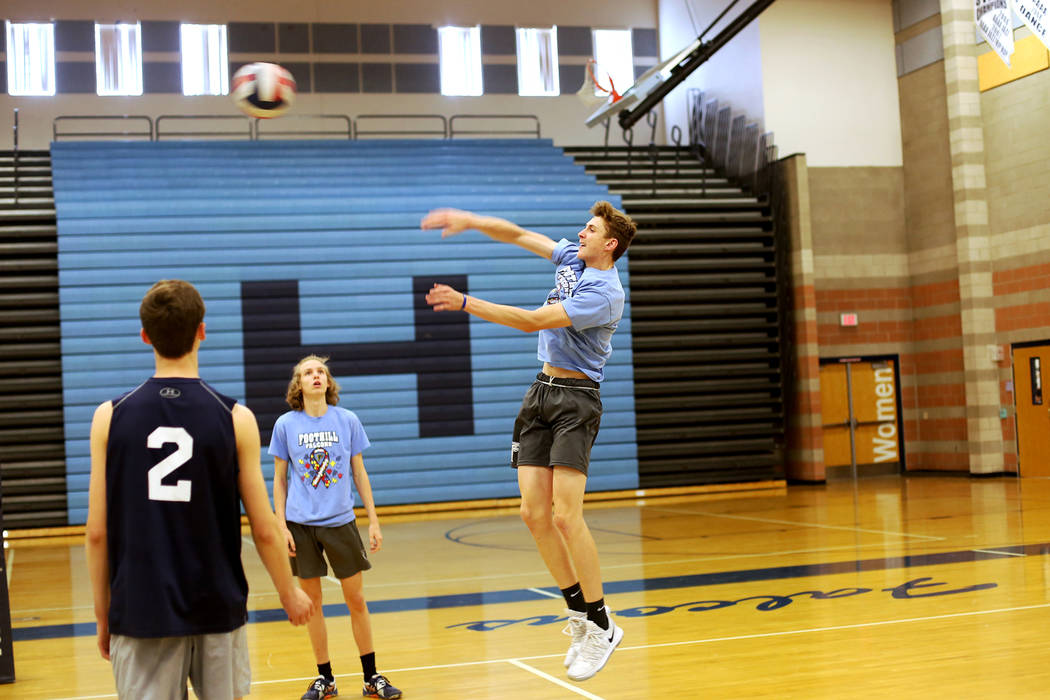 Caleb Stearman, 17, of the Foothill High School mens volleyball team, hits the ball during practice at Foothill High School in Henderson, Monday, May 14, 2018. Stearman is both a setter on the vol ...