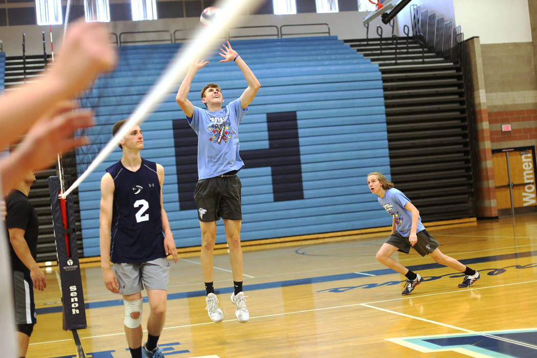 Caleb Stearman, 17, of the Foothill High School mens volleyball team, hits the ball during practice at Foothill High School in Henderson, Monday, May 14, 2018. Stearman is both a setter on the vol ...