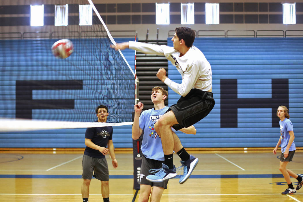 Caleb Stearman, 17, of the Foothill High School mens volleyball team, watches teammate Truss Erb spike the ball during practice at Foothill High School in Henderson, Monday, May 14, 2018. Stearman ...