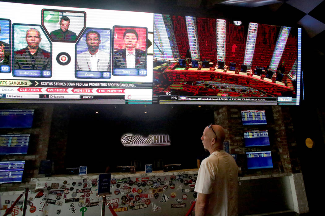 Gary Brown from Toronto checks the lines at the SLS Sports Book on Monday, May 14, 2018. Michael Quine/Las Vegas Review-Journal @Vegas88s