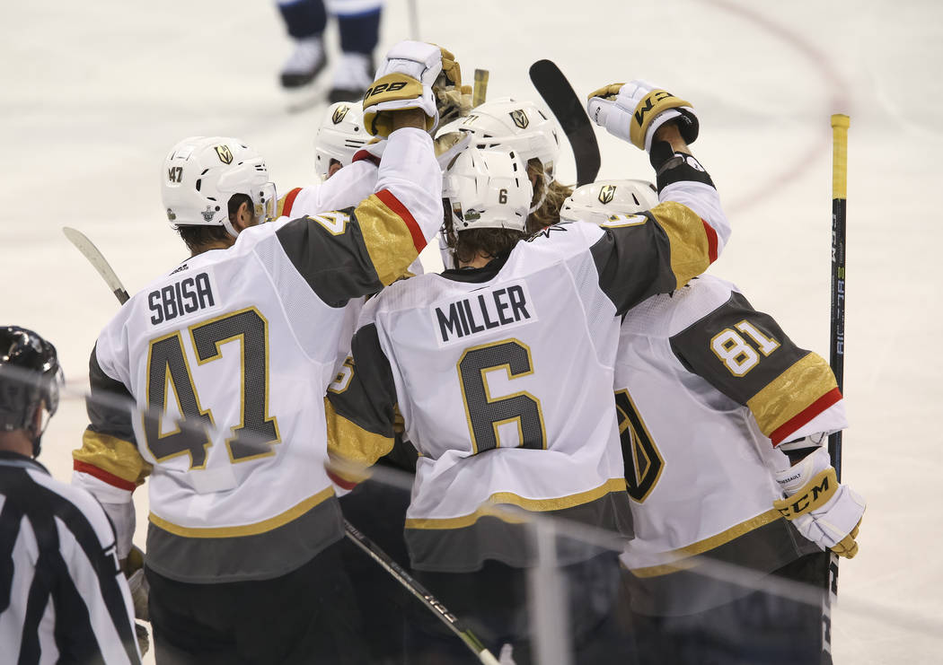 The Vegas Golden Knights celebrate a third period goal by Jonathan Marchessault (81) against Winnipeg Jets in Game 2 of an NHL hockey third round playoff series at the Bell MTS Place in Winnipeg, ...