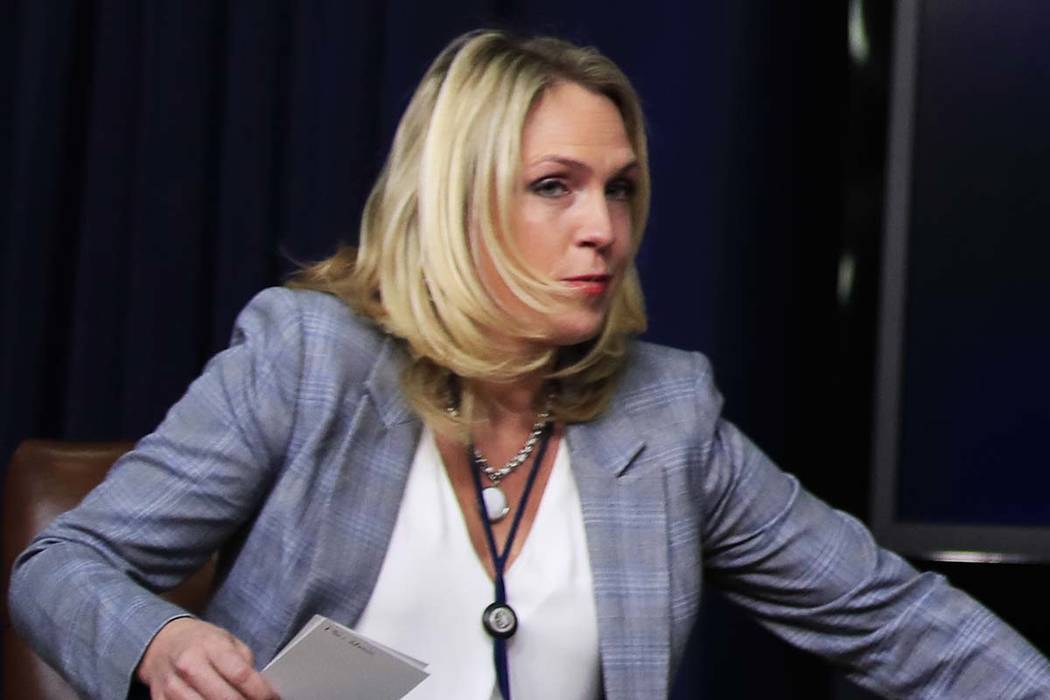 In this March 22, 2018 photo, special assistant to President Donald Trump, Kelly Sadler attends a forum at the Eisenhower Executive Office Building on the White House complex in Washington. The Wh ...