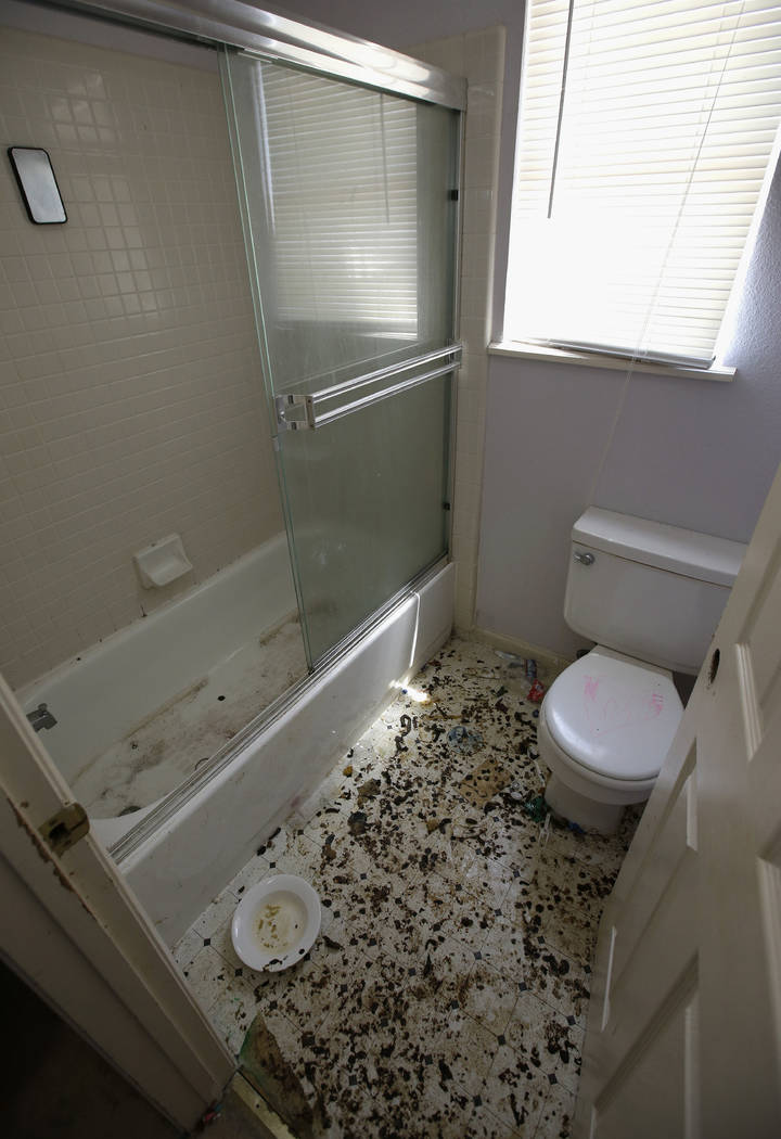 The bathroom is strewn with feces at a home in Fairfield, Calif., Monday, May 14, 2018, where authorities removed 10 children and charged their father with torture and their mother with neglect af ...