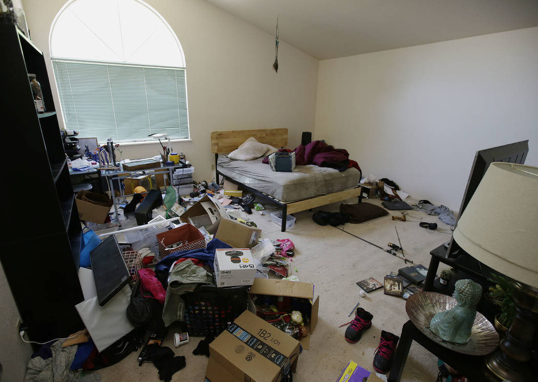 Toys and other items are strewn around one of the bedrooms of a home in Fairfield, Calif., Monday, May 14, 2018, where authorities removed 10 children and charged their father with torture and the ...