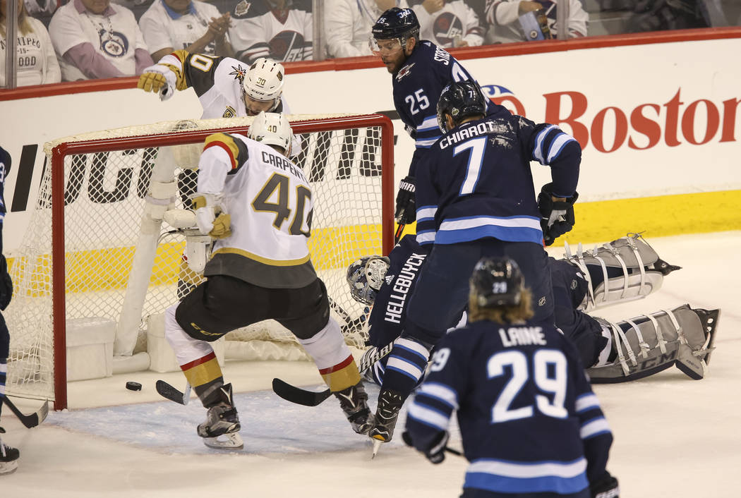 Vegas Golden Knights center Ryan Carpenter (40) attempts to score against the Winnipeg Jets during the first period in Game 1 of an NHL hockey third round playoff series at the Bell MTS Place in W ...