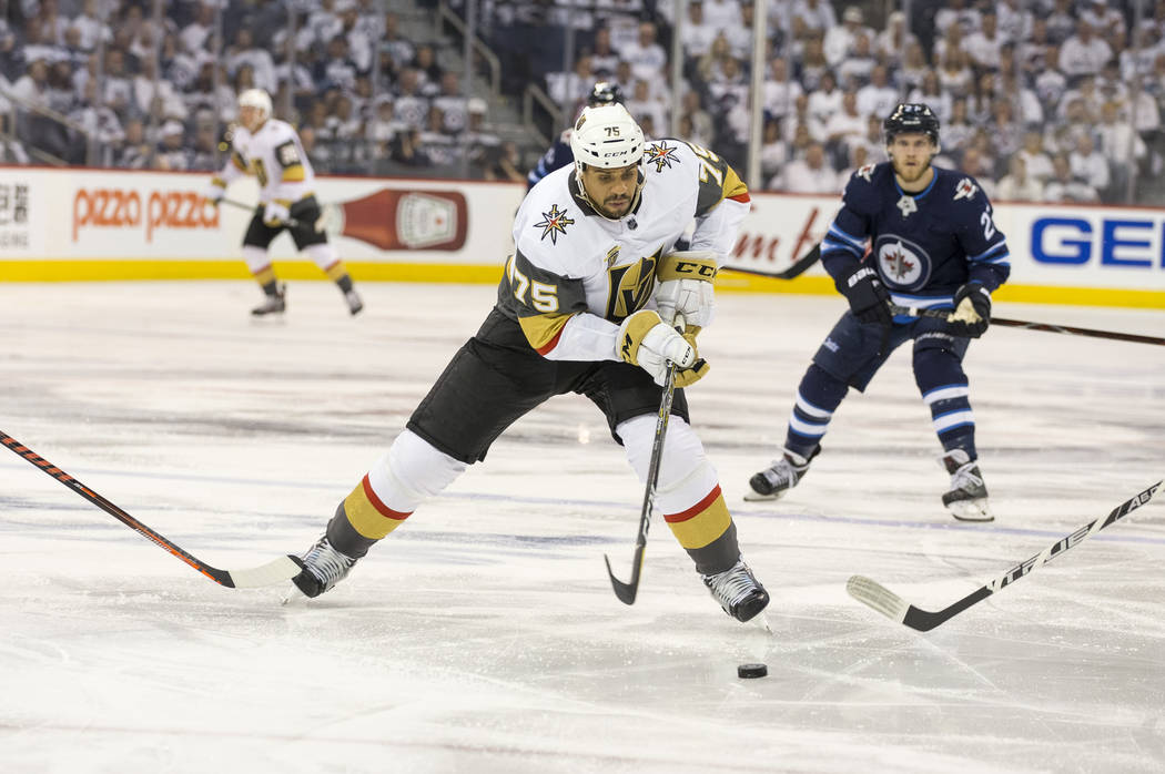 Vegas Golden Knights right wing Ryan Reaves (75) controls the puck against the Winnipeg Jets during the second period in Game 2 of an NHL hockey third round playoff series at the Bell MTS Place in ...