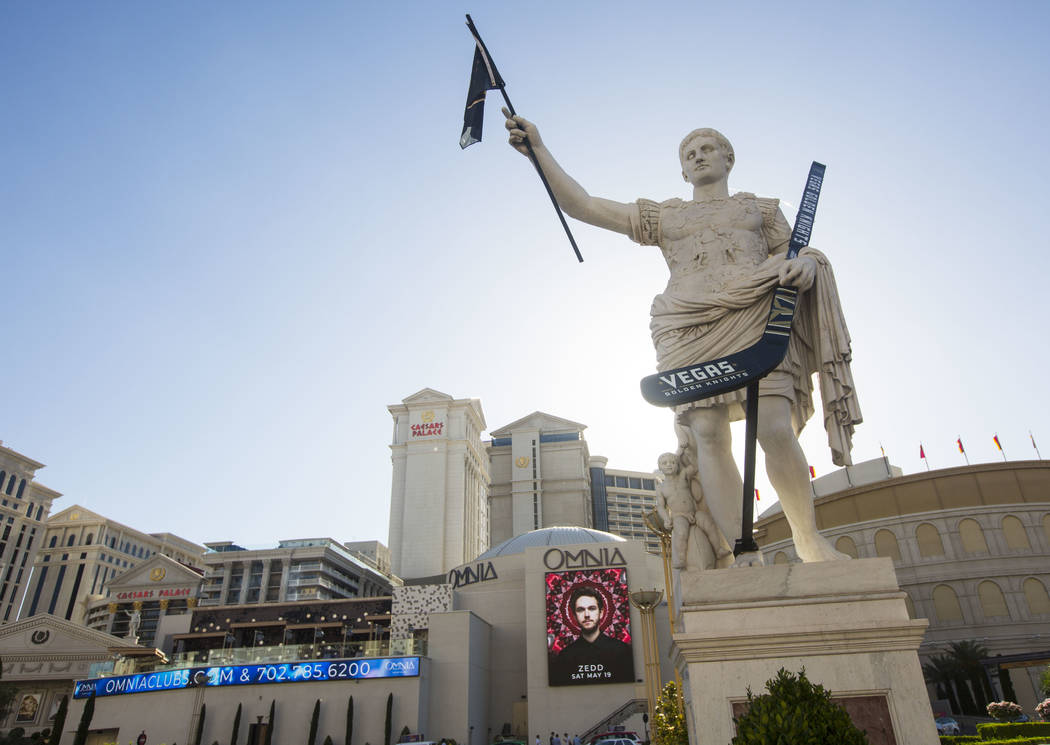 Statue in front of Caesars Palace donning Golden Knights jersey