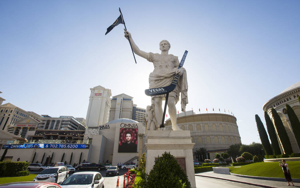 A statue of Julius Caesar is seen adorned with a Golden Knights flag and hockey stick outside of Caesars Palace in Las Vegas on Tuesday, May 15, 2018. Chase Stevens Las Vegas Review-Journal @csste ...