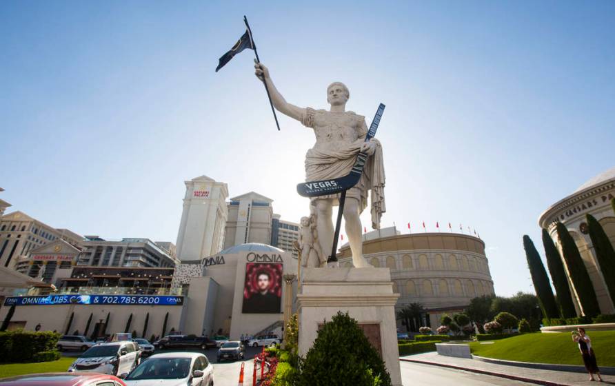 Caesars Palace statue now holds Golden Knights hockey stick — PHOTOS