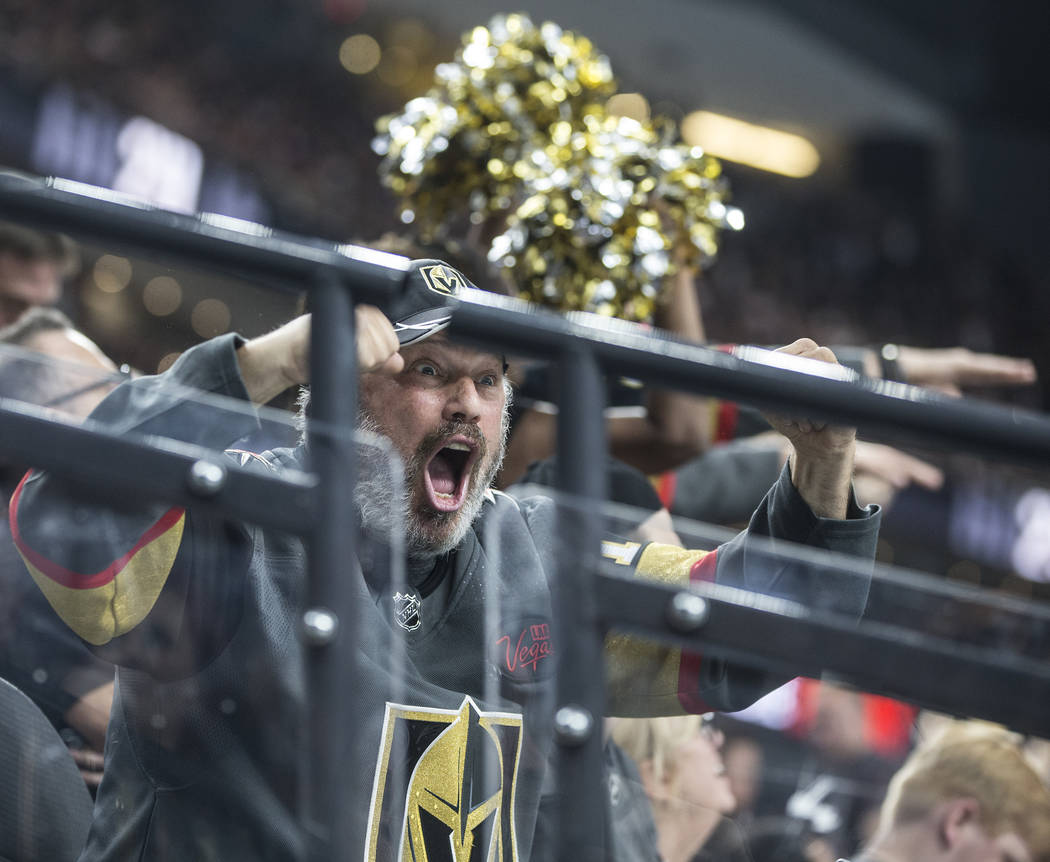 Golden Knights fans cheer for their home team during the first period of game four of Las Vegas' NHL Western Conference Finals matchup with Winnipeg on Friday, May 18, 2018, at T-Mobile Arena, in ...