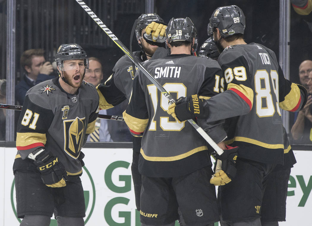 The Golden Knights celebrate after center William Karlsson (71) scored a first period goal during game four of Las Vegas' NHL Western Conference Finals matchup with Winnipeg on Friday, May 18, 201 ...