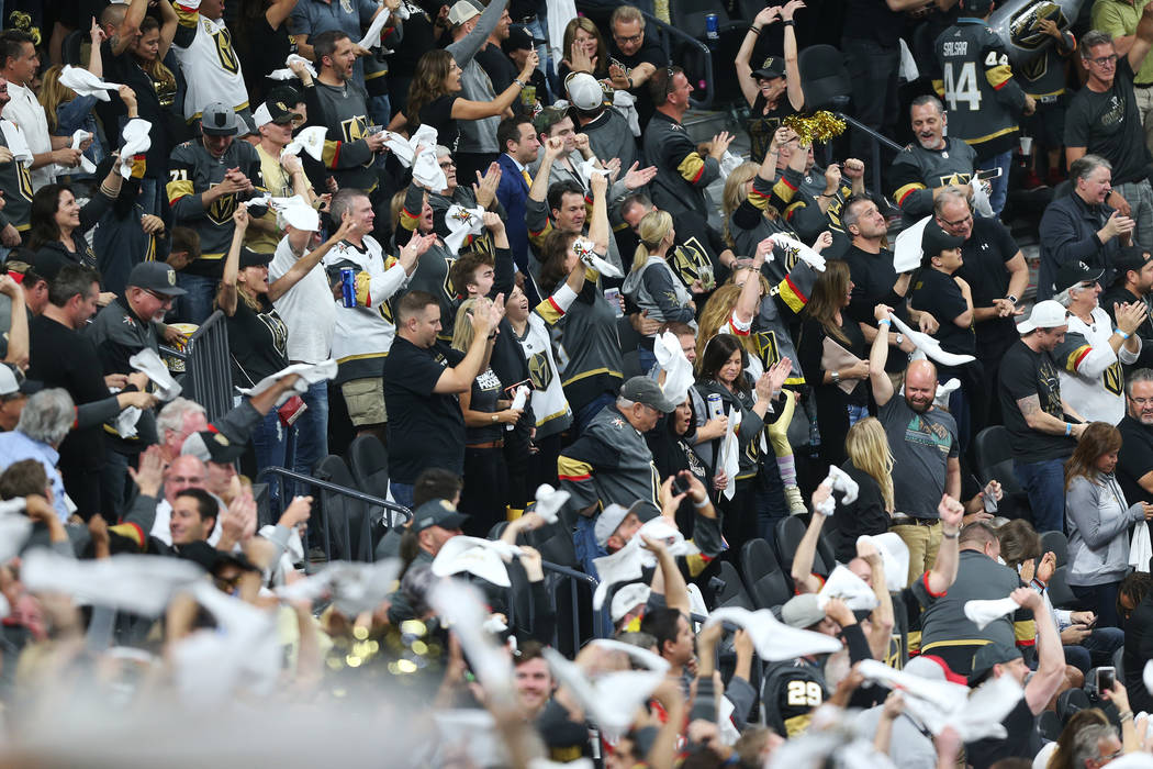Fans celebrates a goal by Vegas Golden Knights center William Karlsson (71) during the first period in Game 4 of the Western Conference Final at T-Mobile Arena in Las Vegas, Friday, May 18, 2018. ...