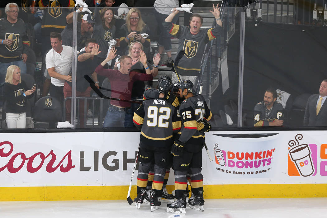 Vegas Golden Knights left wing Tomas Nosek (92) celebrates his score with his team against the Winnipeg Jets during the second period in Game 4 of the Western Conference Final at T-Mobile Arena in ...