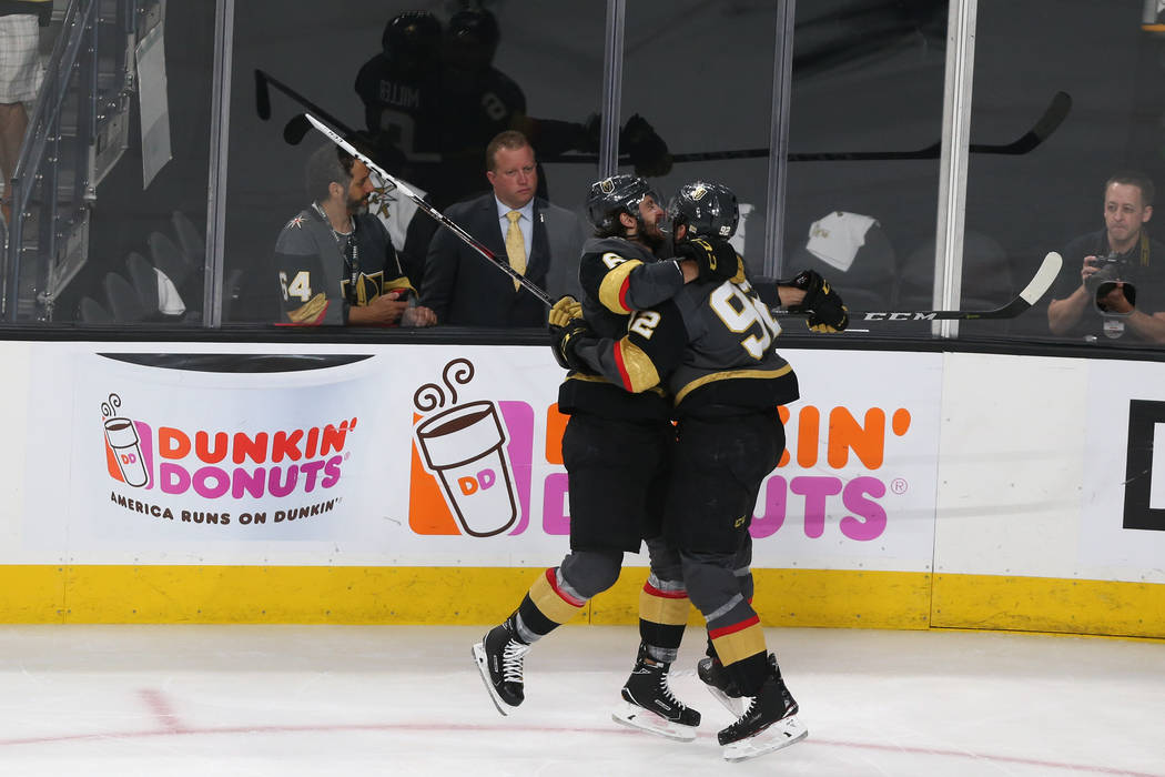 Vegas Golden Knights left wing Tomas Nosek (92) celebrates his score with defenseman Colin Miller (6) against the Winnipeg Jets during the second period in Game 4 of the Western Conference Final a ...