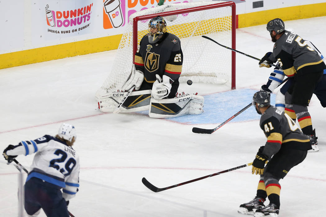 Winnipeg Jets right wing Patrik Laine (29) shoots for a score against Vegas Golden Knights goaltender Marc-Andre Fleury (29) during the second period in Game 4 of the Western Conference Final at T ...