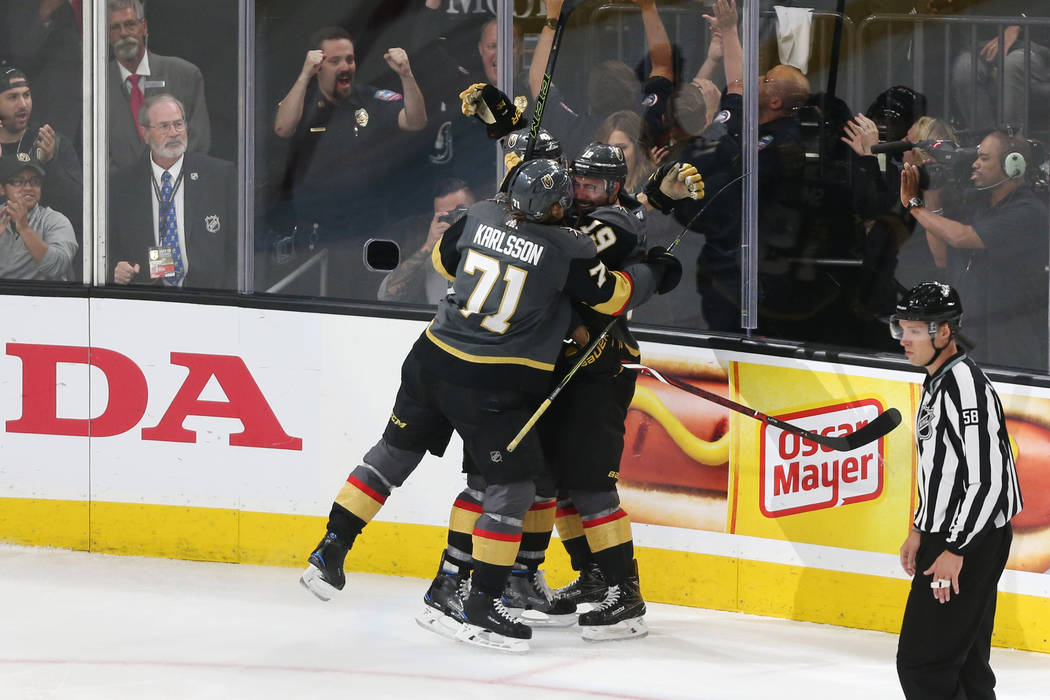 Vegas Golden Knights right wing Reilly Smith (19) celebrates his score with center William Karlsson (71) against Winnipeg Jets during the third period in Game 4 of the Western Conference Final at ...