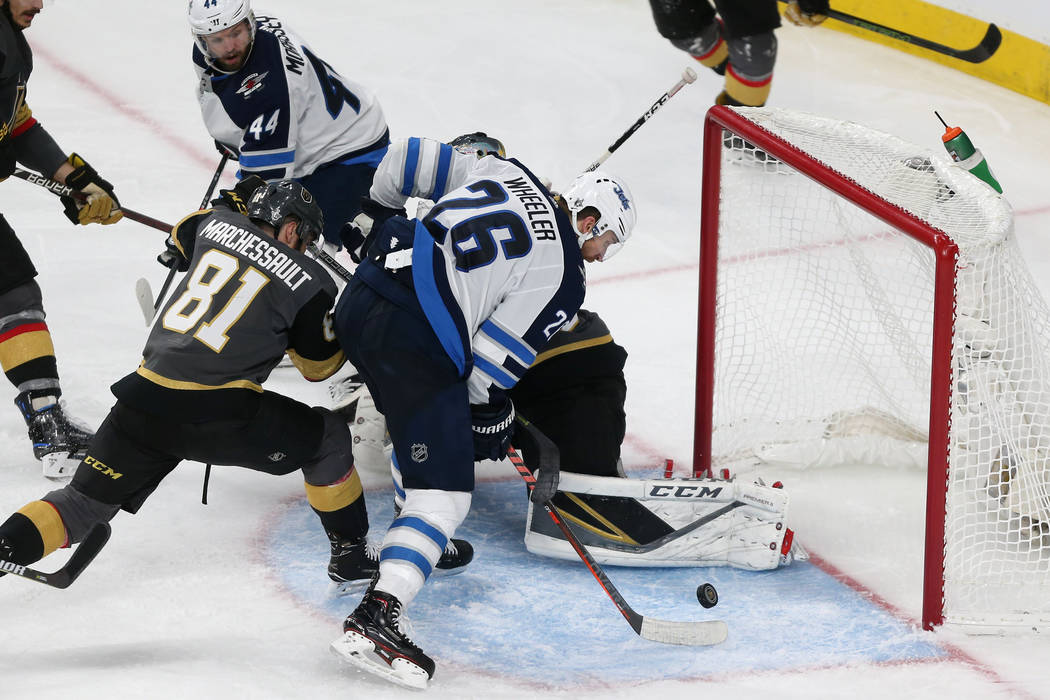 Winnipeg Jets right wing Blake Wheeler (26) misses a goal opportunity against Vegas Golden Knights during the third period in Game 4 of the Western Conference Final at T-Mobile Arena in Las Vegas, ...