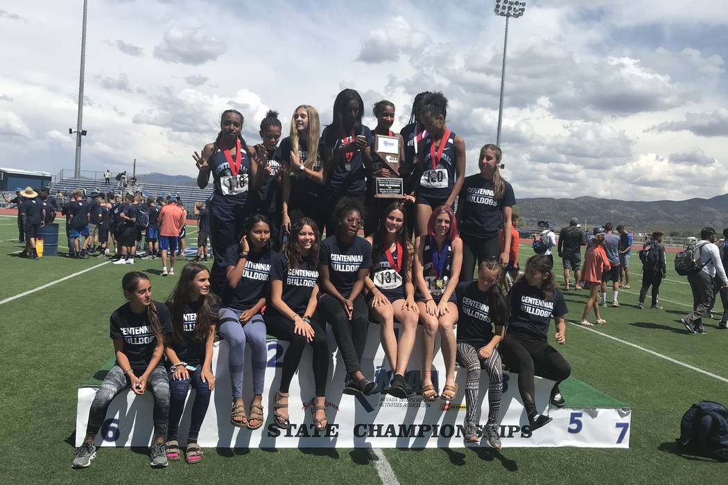 Centennial's girls track and field team poses with the Class 4A state championship trophy at Carson High School on Saturday afternoon. Sam Gordon/Las Vegas Review-Journal.