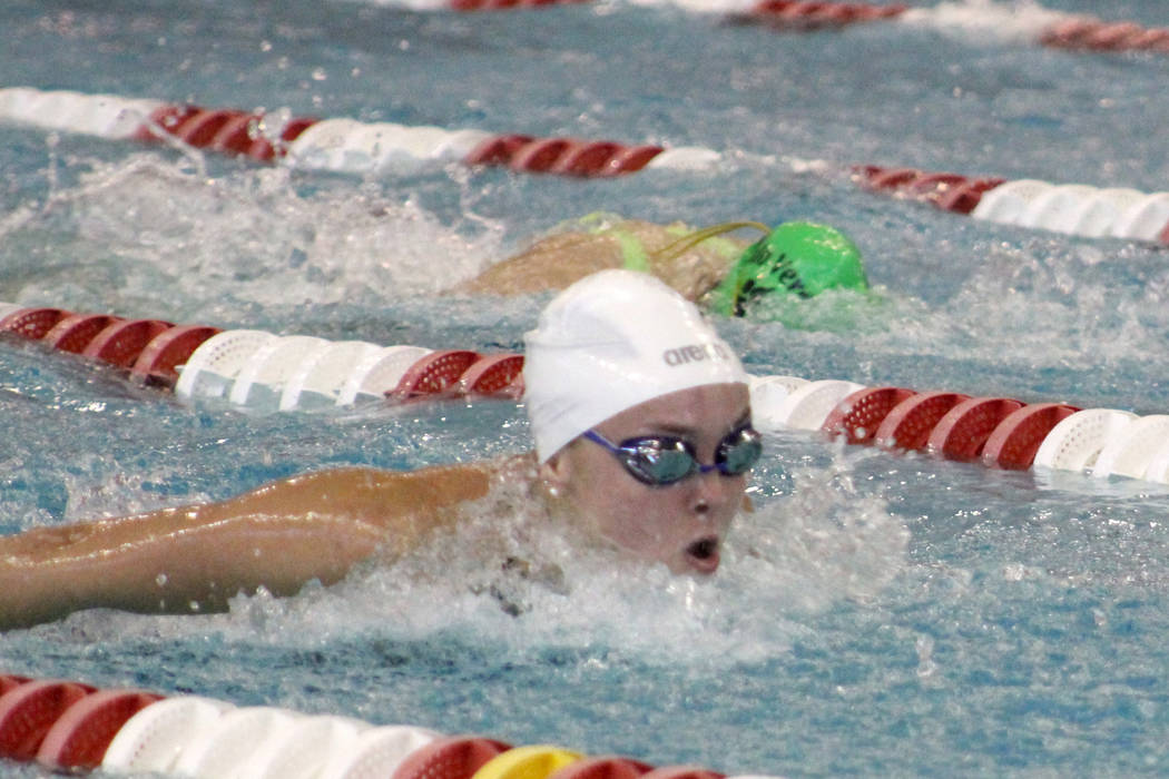 Green Valley's Liz Clinch competes in the 100 butterfly during the Class 4A state championships on Saturday, May 19, 2018 at UNLV. Clinch won the event in 55.69 seconds. (Tim Guesman/Las Vegas Rev ...