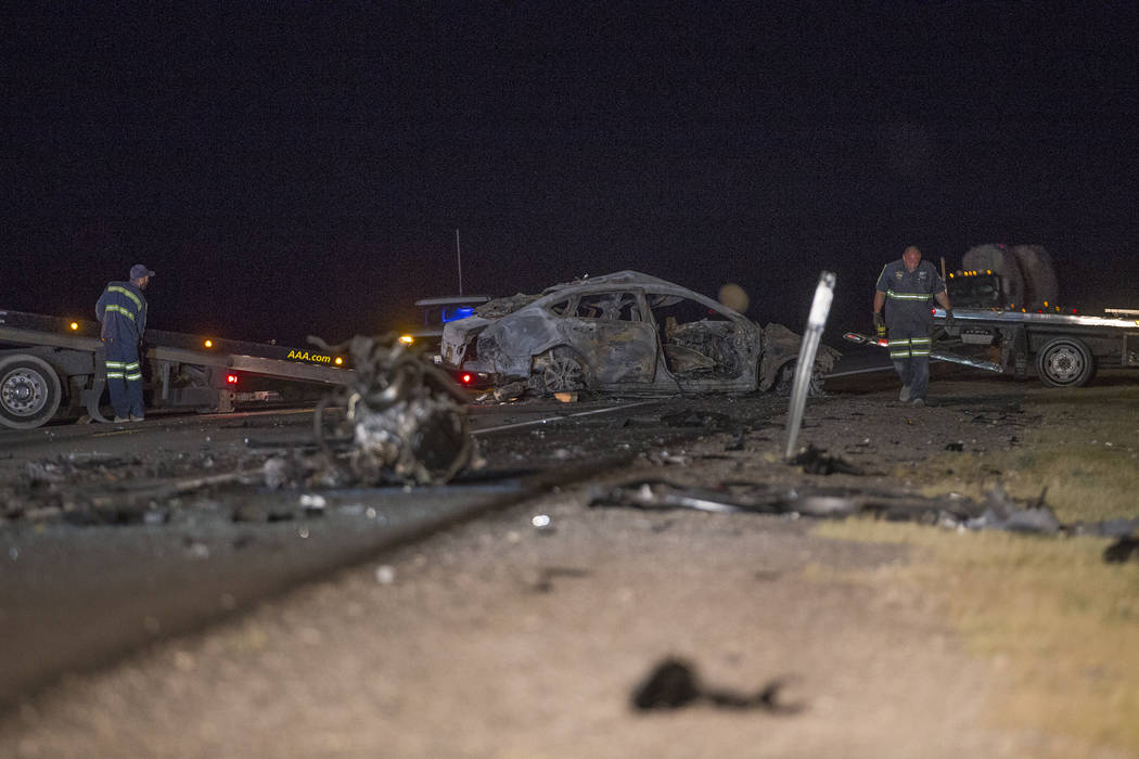 The northbound Nissan that was fully engulfed in flames in the multi fatality crash on U.S. Highway 95, near Amargosa Valley in Nye County, Sunday, May 20, 2018. (Rachel Aston Las Vegas Review-Jou ...