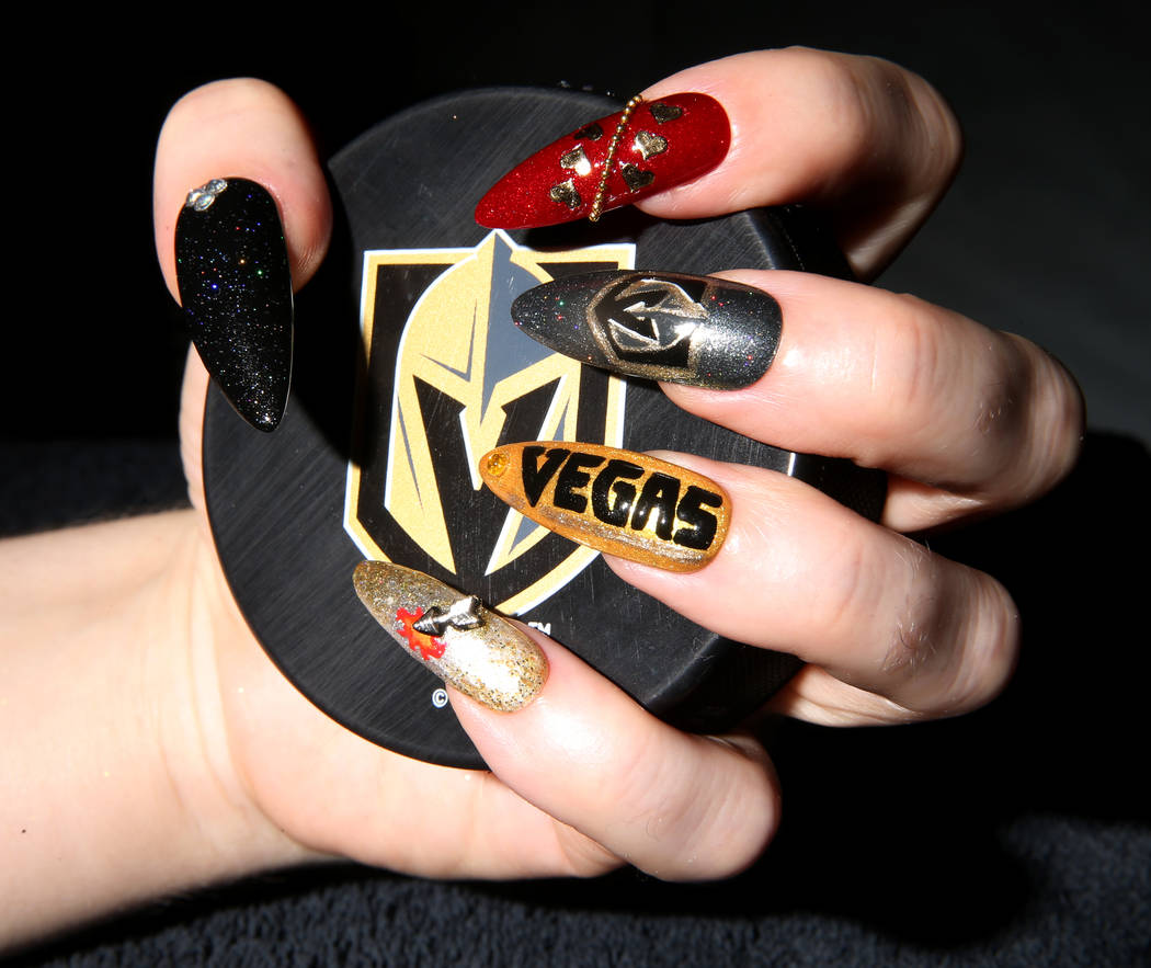 Andrea Lipomi, owner of Feetish Spa Parlor, shows her Vegas Golden Knights-themed nails at her downtown salon Tuesday, May 29, 2018. K.M. Cannon Las Vegas Review-Journal @KMCannonPhoto