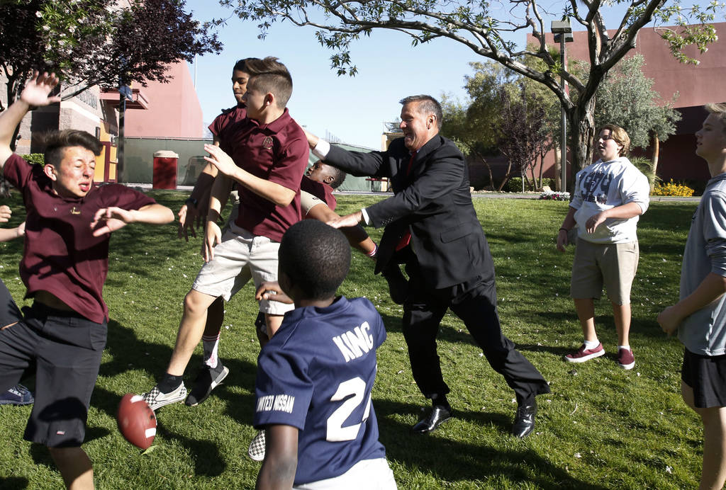 Dr. Steve Buuck, CEO and administrator of Faith Lutheran Middle and High School, plays football with his students on Wednesday, May 23, 2018, in Las Vegas. Bizuayehu Tesfaye/Las Vegas Review-Jour ...