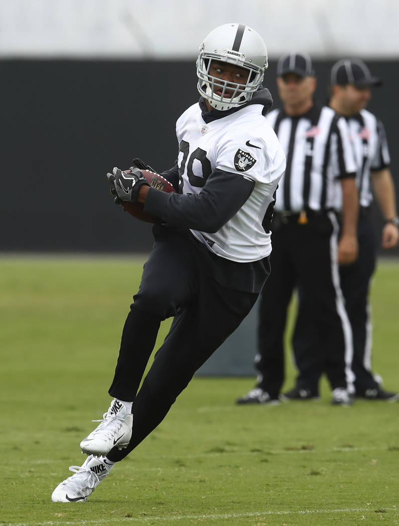 Oakland Raiders' Amari Cooper runs during NFL football practice on Tuesday, May 22, 2018, at the team's training facility in Alameda, Calif. (AP Photo/Ben Margot)